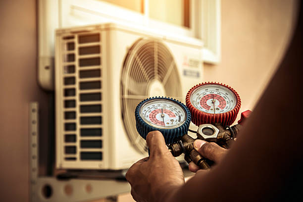 Professional Heat Pump Repair technician working in Alton, TX